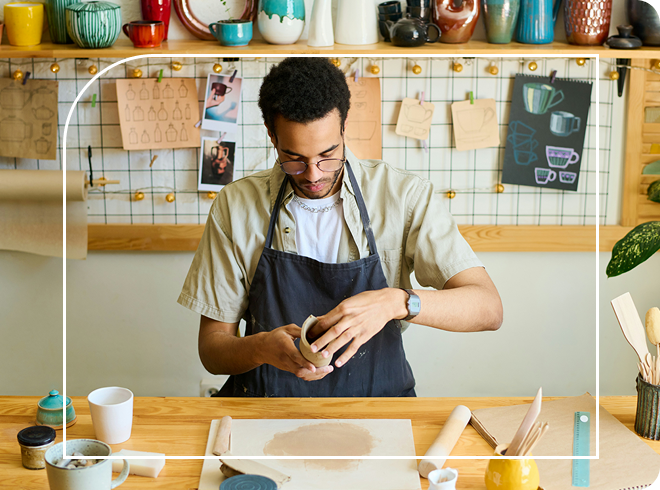 Small business owner doing pottery